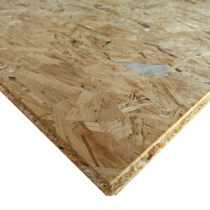Nahaufnahme einer Holzspanplatte, die die Textur und den Aufbau aus komprimierten Holzspänen zeigt.