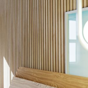 Ein modernes Interieur mit einer Wand aus vertikalen Holzlatten, einem Holzregal, und mehreren an die Wand gelehnten Bildern. Ein Teil einer beleuchteten Lampe ist rechts im Bild sichtbar.