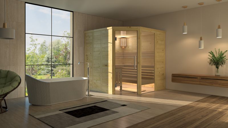 Moderner Raum mit einer freistehenden Badewanne und einer Holzsauna neben großen Fenstern mit Blick ins Freie.